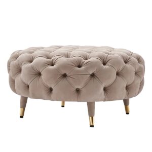 Round tufted ottoman with brass legs