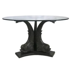 Glass table with dolphin-shaped metal base