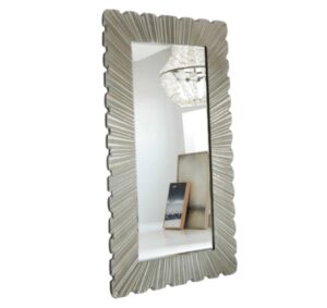 Rectangular sunburst mirror reflecting modern chandeliers.