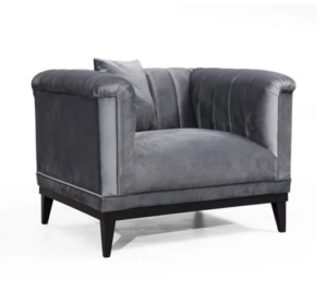 Modern grey velvet armchair with cushion