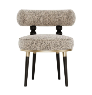 Modern patterned chair with black legs and gold trim.