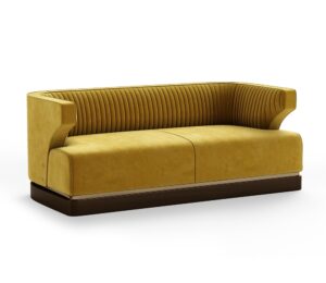 Yellow velvet sofa with ribbed backrest and wooden base.