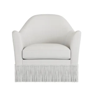 White armchair with fringe skirt details.