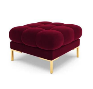 Modern burgundy ottoman with gold legs.