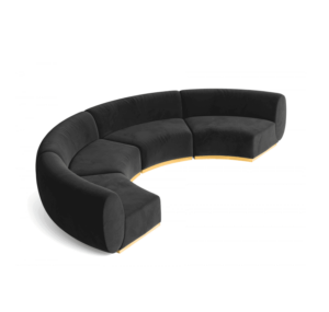 Curved black sofa with gold accents.