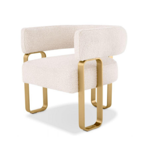 Modern armchair with gold accents, white upholstery.
