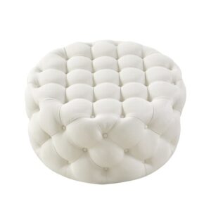 White round tufted ottoman with button details.