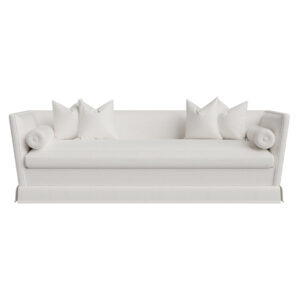 Elegant white sofa with cushions and bolster pillows.