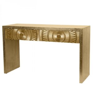 Golden decorative console table with geometric patterns.