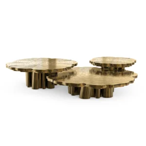 Gold coffee tables with irregular shapes.