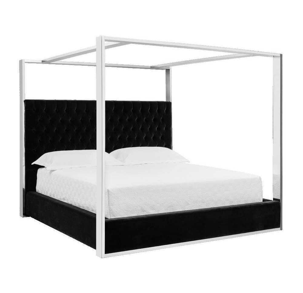 Modern four-poster bed with black headboard.