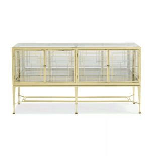 Stylish gold display cabinet with geometric patterns.