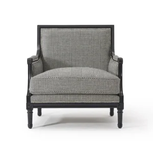 Plaid upholstered armchair with black wooden frame