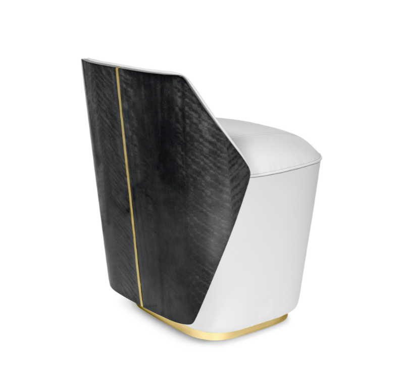 Modern chair with white seat, black back, gold trim