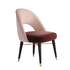 Elegant velvet dining chair with gold accents.