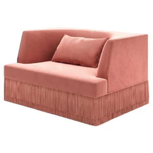 Pink velvet sofa with cushion and fringe design.